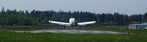 Piper Cherokee GNIC see in the flare on Runway 19 at Langley Airport. Langley Flying School