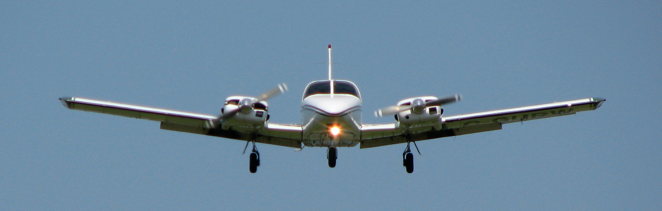 Langley Flying School's Piper Seneca, used for advanced flight training, on approach into Langley Airport.