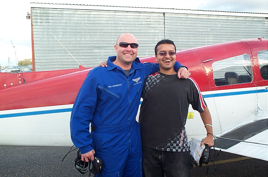 Aaron Pinto with Flight Instructor Rod Giesbrecht after completing his First Solo Flight on November 13, 2007.  Langley Flying School