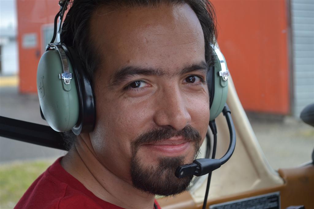 Ahmadreza Farrokhpour in the cockpit of Cherokee GUKG after the completion of his First Solo Flight on August 9, 2011 .  Langley Flying School.