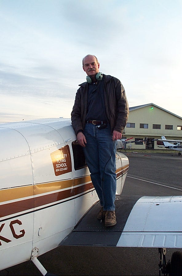 Alan March on the wing of Cherokee GURK after the completion of his First Solo Flight on December 8, 2007. Langley Flying School.