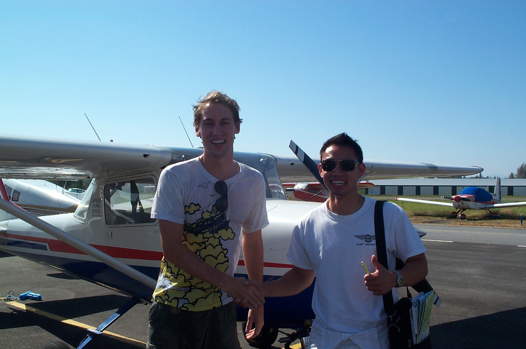 Alex Close with Flight Instructor Nam Vu, Langley Flying School.