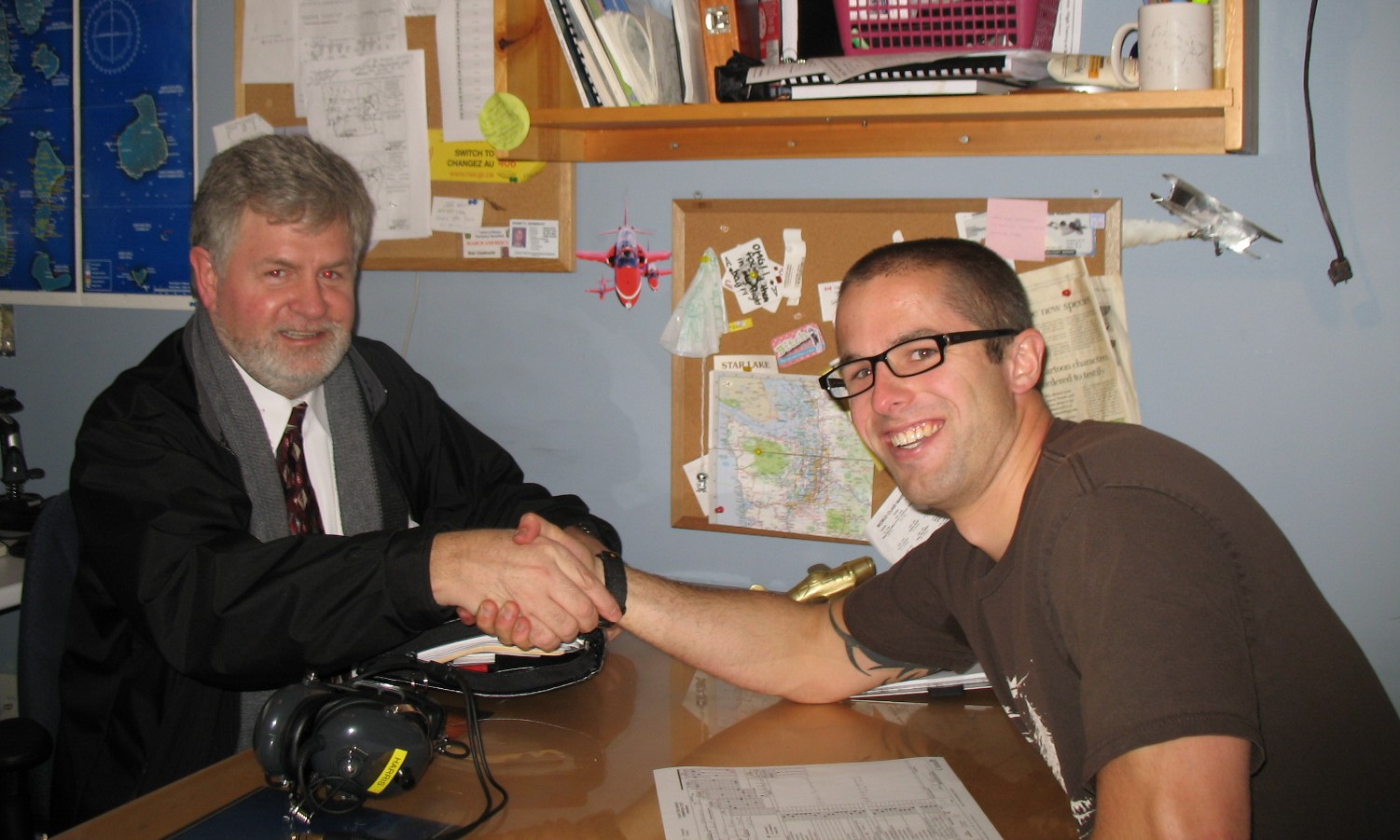 Andrew Otterstrom with Pilot Examiner Paul Harris after the successful completion of Andrew's Commercial Pilot Flight Test on November 5, 2008.  Langley Flying School