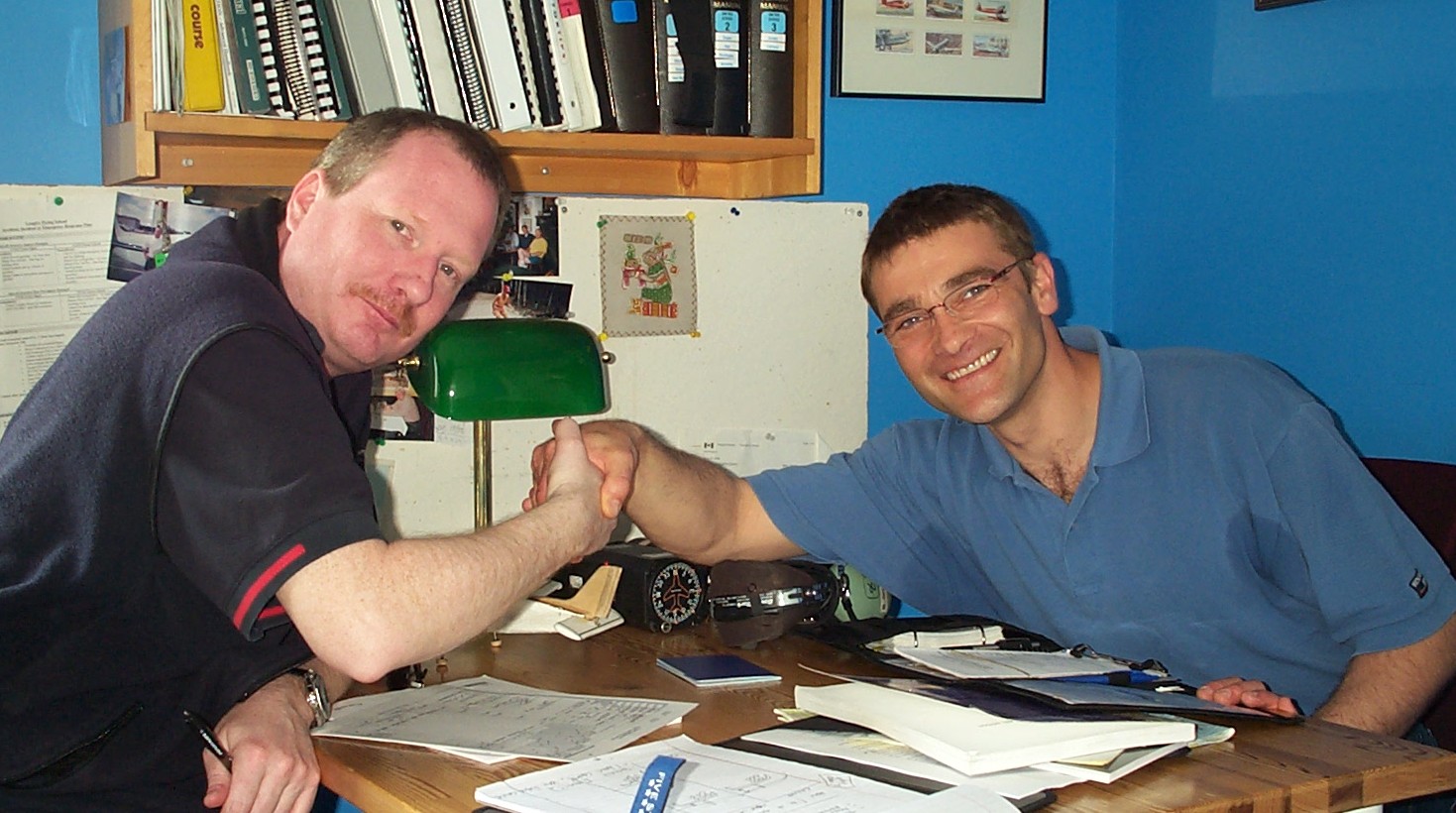 Beda Grunder receives congratulations from Transport Canada Inspector Peter Cox after the successful completion of Beda's Class IV Flight Instructor Rating Flight Test on April 16, 2010. Langley Flying School.