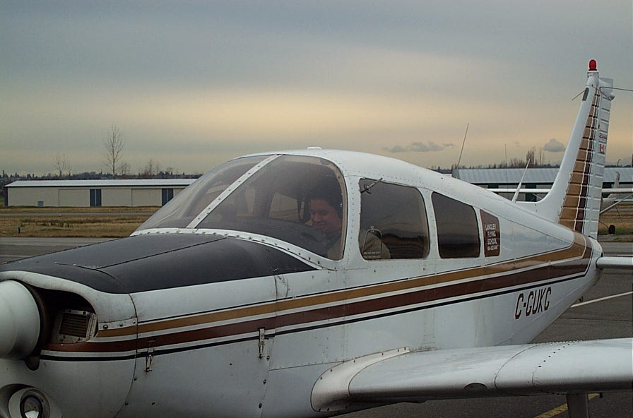 Carlos Calderon Gutierrez in Cherokeed GUKG after the successful completion of his First Solo Flight on January 15, 2008. Langley Flying School.