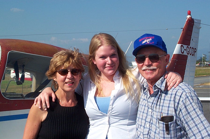 Private Pilot Graduate Carolyn Kristensen with Flight Instructor Rita Methorst and Pilot Examiner Donn Richardson, Langley Flying School.