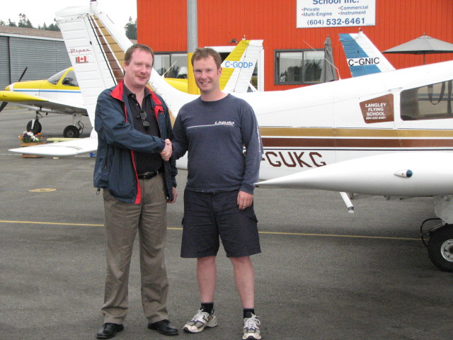 Flight Instructor Darren Ferguson with Transport Canada Inspector Peter Cox.  Langley Flying School