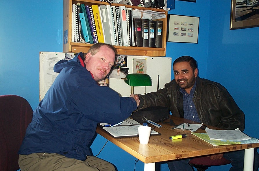 Gobind Sandhanwalia with Transport Canada Inspector Peter Cox after the successful completion of Gobind's Instructor Rating Flight Test on October 15, 2009.  Langley Flying School.