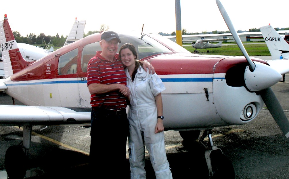 Gregg Goodfellow with his Flight Instructor, Naomi Jones, after the successful completion of Gregg's Private Pilot Flight Test on May 17, 2009.  Langley Flying School.
