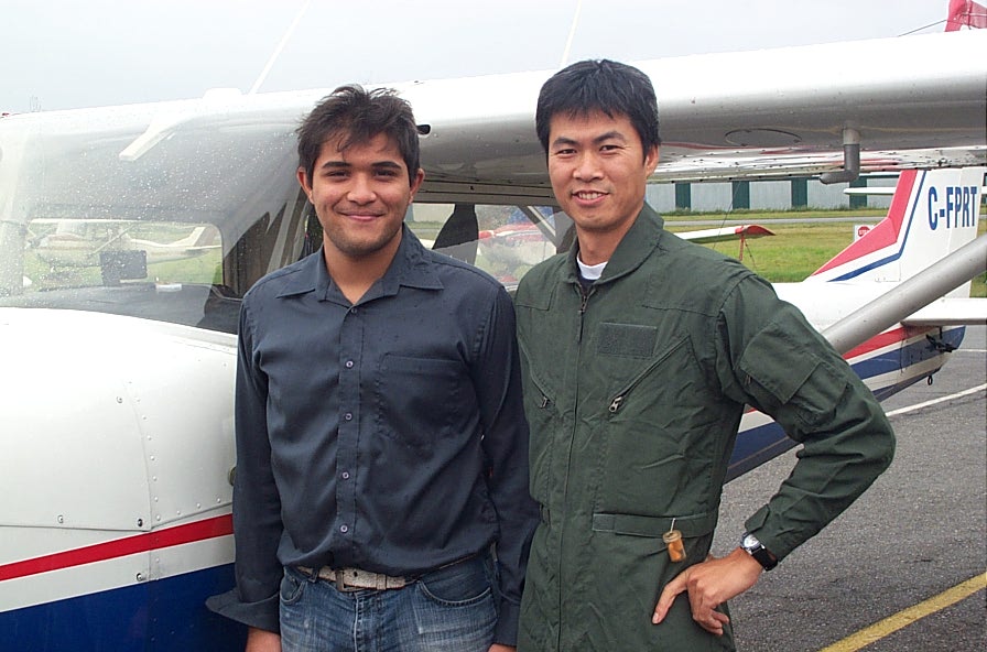 Hussian Lehry with Flight Instructor Hoowan Nam after the completion of Hussian's First Solo Flight on October 16, 2007 in Cessna FPRT. Langley Flying School.