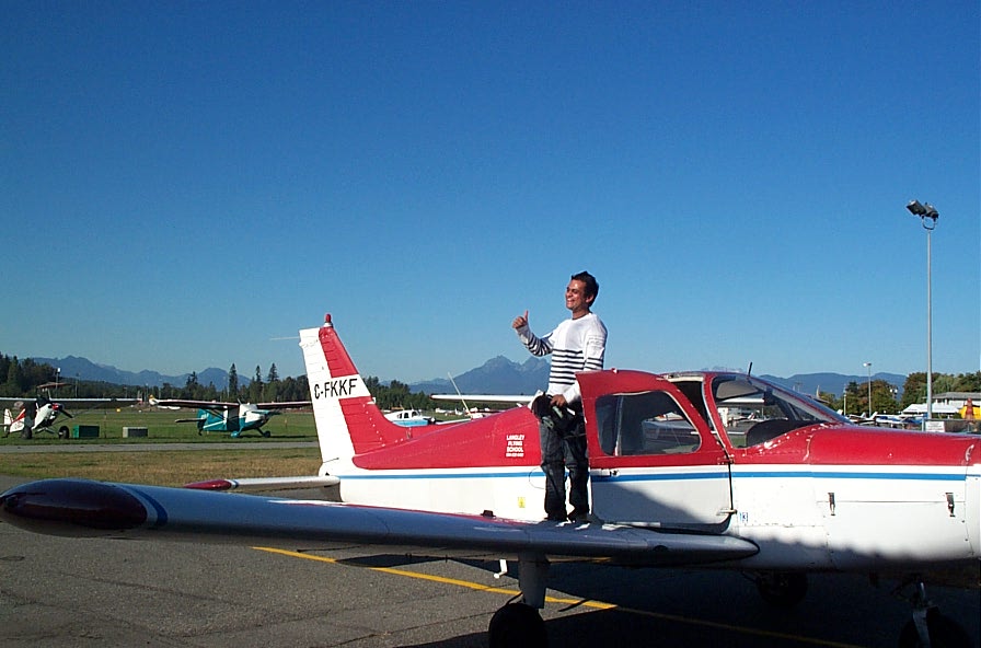 Ishan Patel on the wing of Cherokee FKKF after completing his First Solo Flight on September 22, 2009. Langley Flying School.