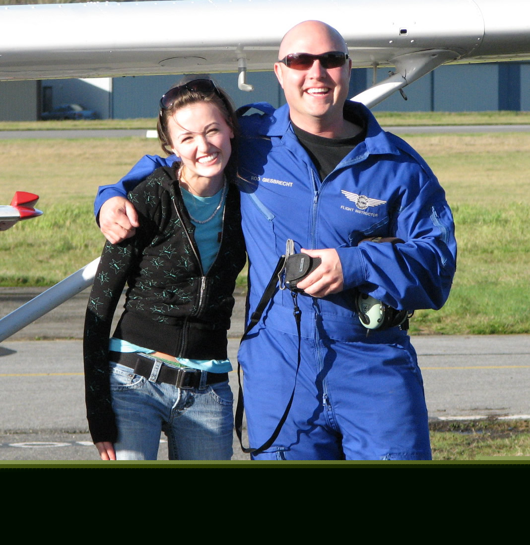 Jessica Knox with Flight Instructor Rod Giesbrecht after completing her First Solo Flight on November 11, 2007 in Cessna FPRT.  Langley Flying School.