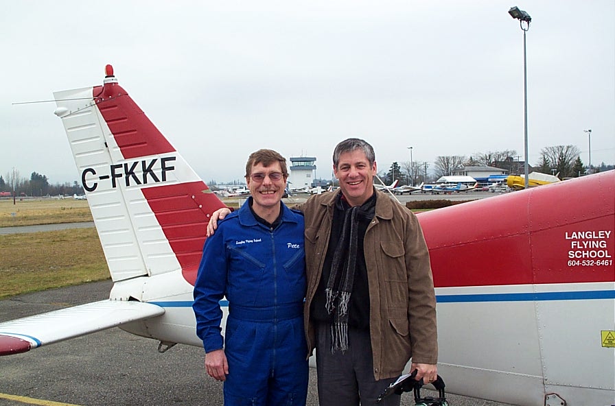 Joel Schacter with Flight Instructor Peter Waddington after the completion of Joel's First Solo Flight on January 17, 2008. Langley Flying School.