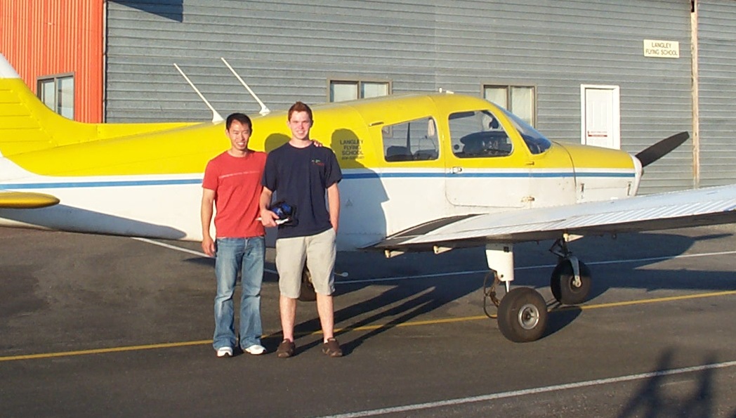 Bruce Kyle with his Flight Instructor, Nam Vu, after the completion of his First Solo Flight on July 20, 2010 in Cherokee GODP.  Langley Flying School.