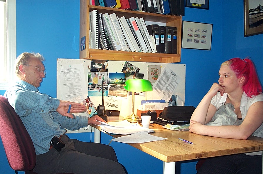 Private Pilot Graduate Liz Carrol with Pilot Examiner Francois Leh after the successful completion of Liz's Flight Test on June 12, 2008.  Langley Flying School