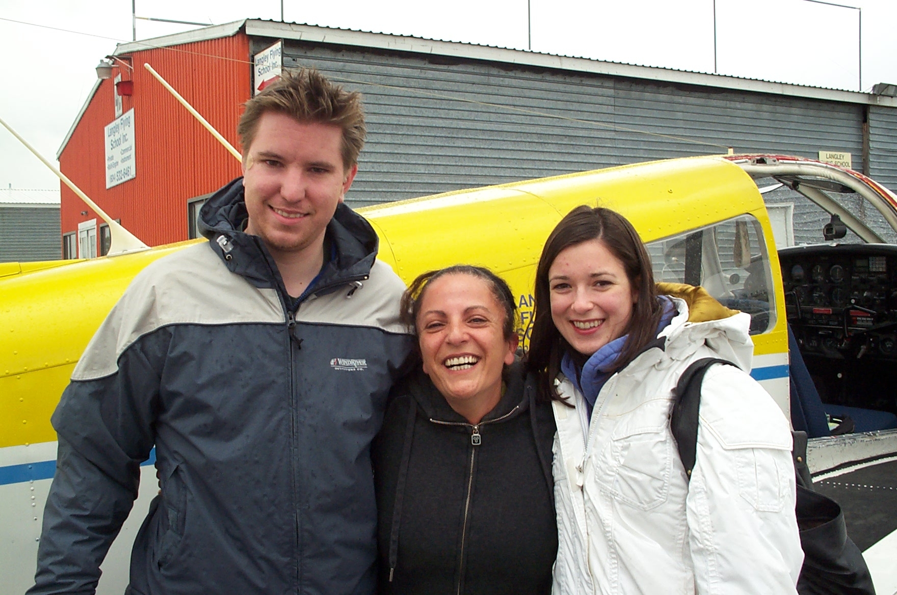 MayBogle with her Flight Instructors, Phil Craig and Naomi Jones, after completing her First Solo Flight on April 23, 2010.  Langley Flying School.