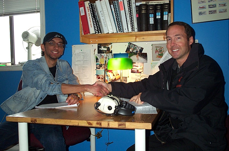 Mayank Mittal with Pilot Examiner Jeff Durrand after the very successful completion of Mayank's Private Pilot Flight Test on January 18, 2008.  Langley Flying School.