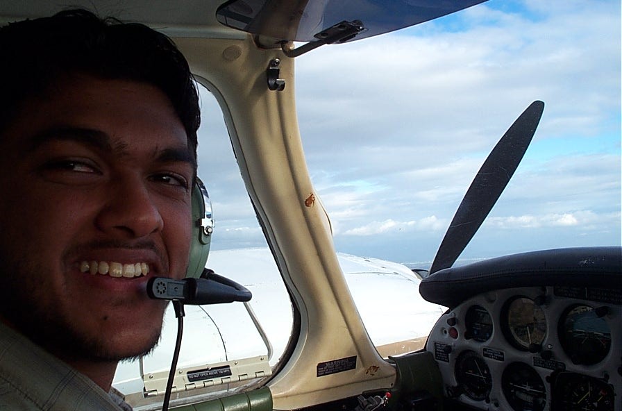 Commercial Pilot Mohit Goyle at the control of Seneca GURW during an engine shut-down drill. Langley Flying School.
