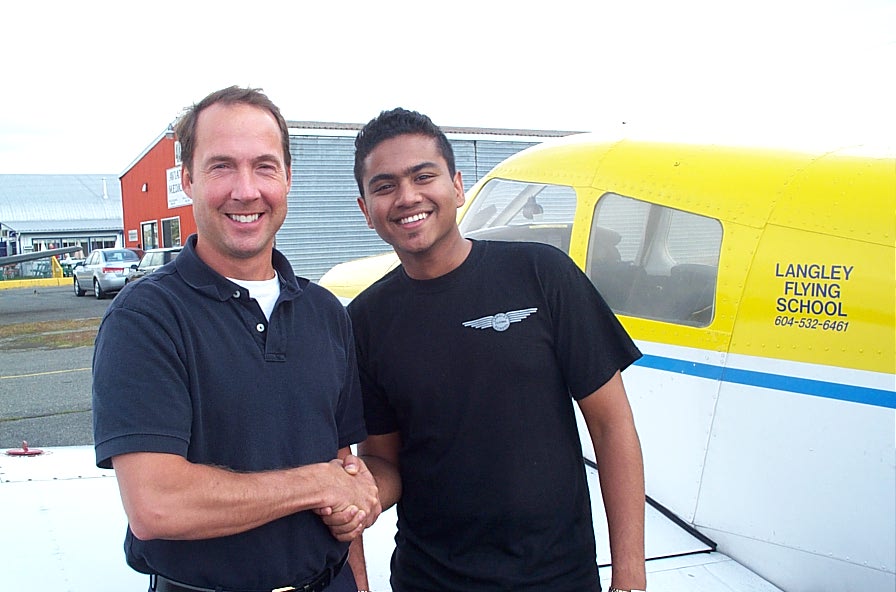 Panks Salve with Jeff Durand after the successful completion of Panks' Private Pilot Flight Test, September 5, 2007, Langley Flying School