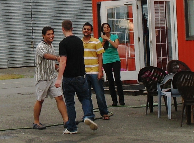Pat Gaudry receives congrats from Hussain Lehry, Ishan Patal, and Sukhmani Frar following his First Solo Flight on August 6, 2009.  Langley Flying School.