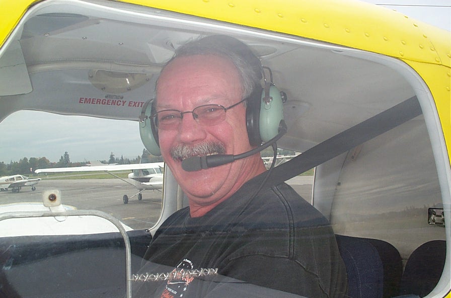 Peter McCreath in the cockpit of Cherokee GODP after completing his First Solo Flight on October 9, 2007. Langley Flying School.