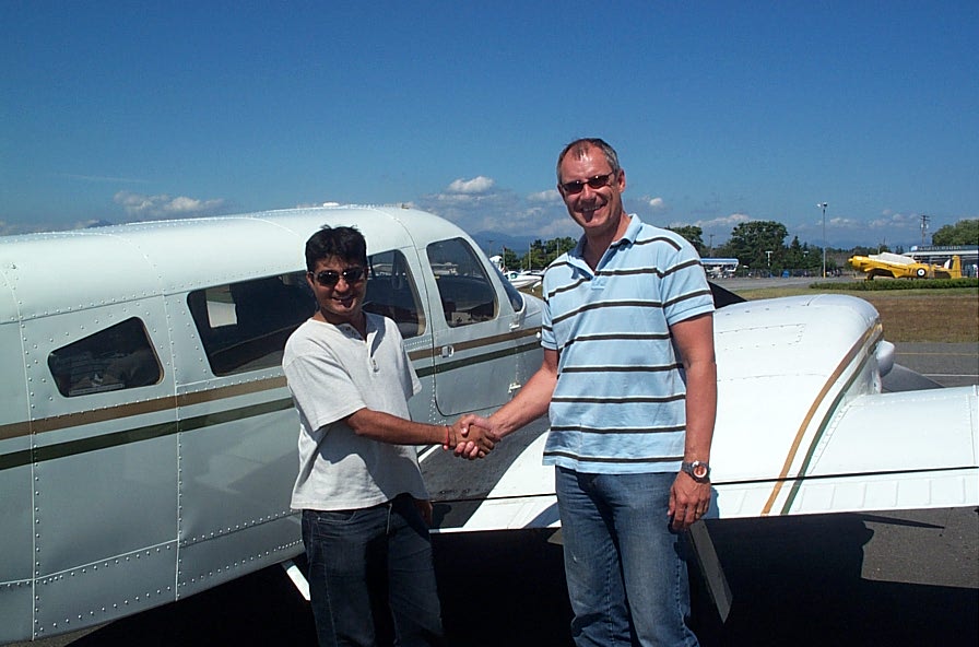 Raman Srivastava with Pilot Examiner Matt Edwards after the successful completion of Raman's Flight Test for the Multi-engine Class Rating on July 9, 2008. Langley Flying School.