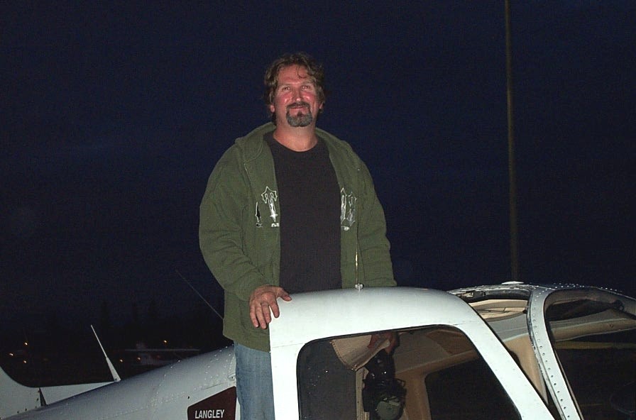 Robert Recknagel on the wing of Cherokee GUKG after the completion of his First Solo Flight on December 4, 2008. Langley Flying School.