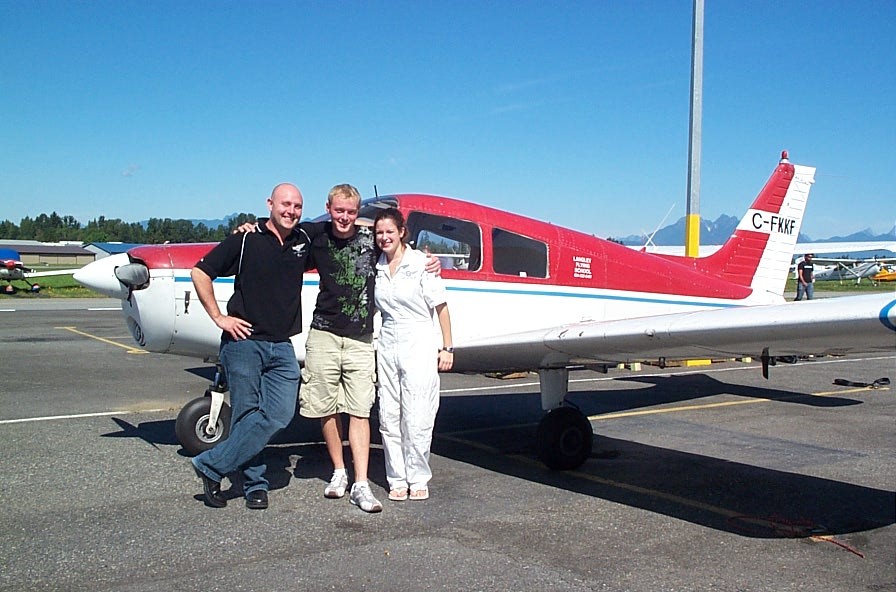 Ryan Kavanagh with Flight Instructor Rod Giesbrecht and Naomi Jones after the successful completion of Ryan's Private Pilot Flight Test.  Langley Flying School.