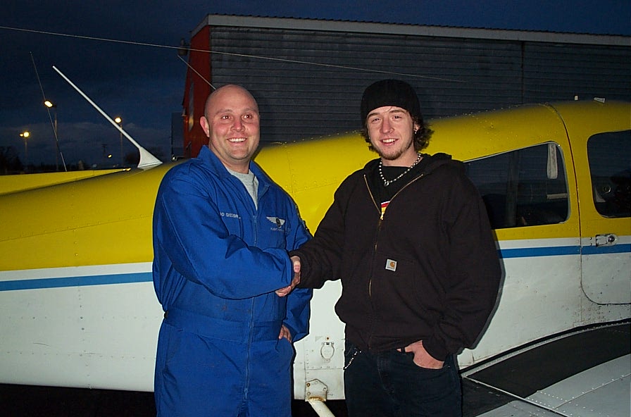 Steve Dikes with Flight Instructor Rod Giesbrecht after the completion of Steve's First Solo Flight on February 10, 2008. Langley Flying School.