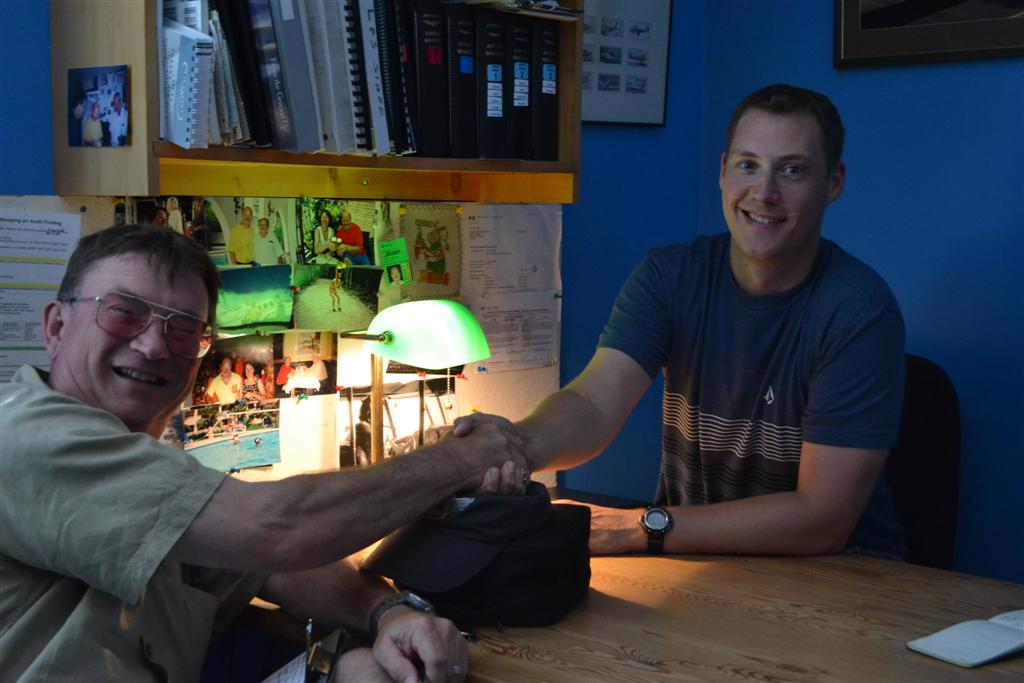 Trevor Conkey and John Laing following Trevor's Post Flight Debriefing. Langley Flying School.