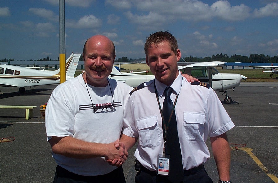Langley Flying School Graduate Elbert Ryhorchuk with Chief Flying Instructor Dave Parry. July, 2008.