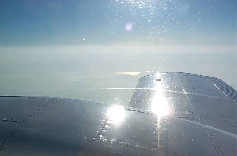 Langley Flying School's Piper Seneca over California.