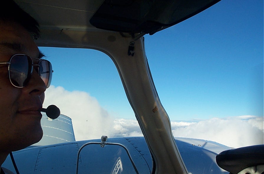 Pilot Sang Lee flying the Seneca of California. Langley Flying School.