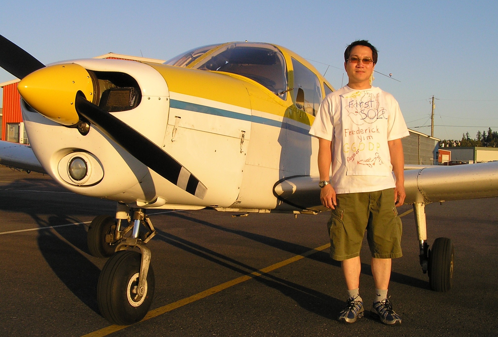Frederick Yim with Cherokee GODP after his First Solo Flight.  Langley Flying School.