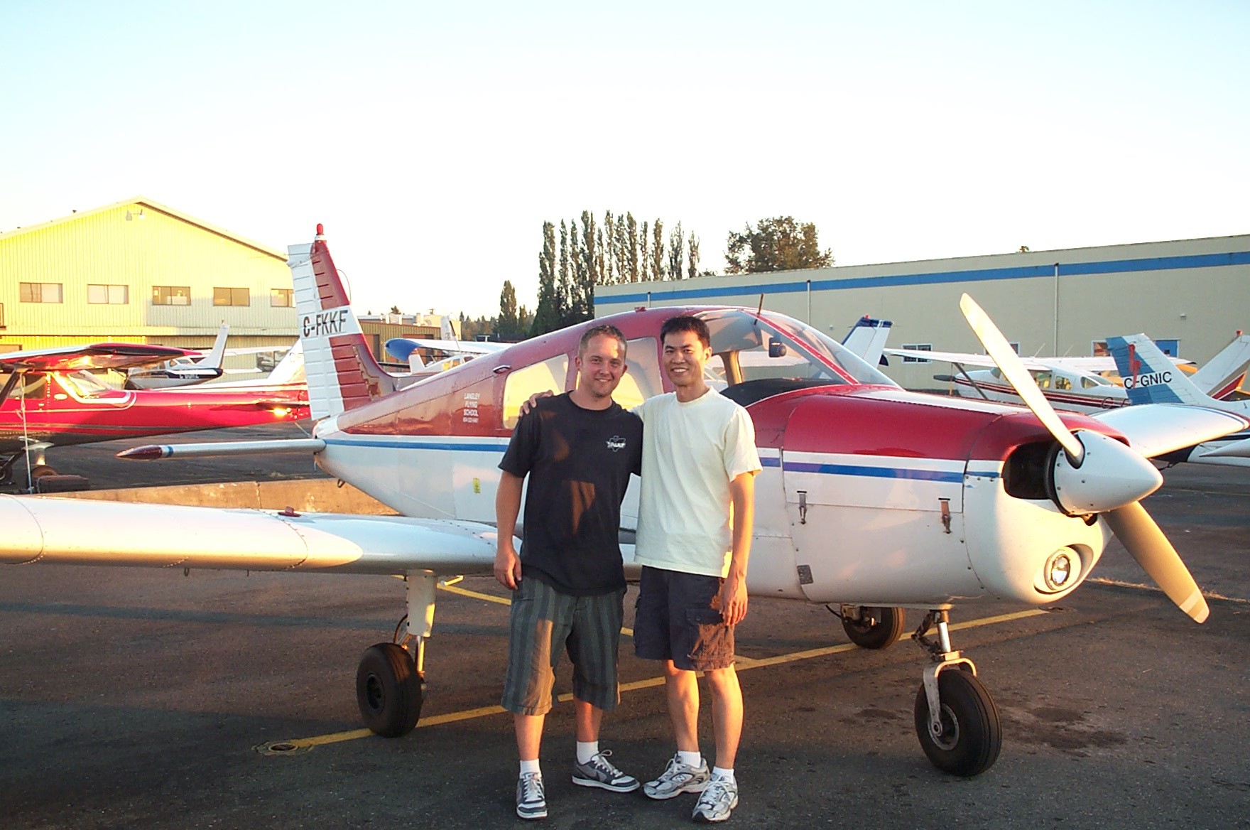 Private Pilot Gradute Jason Nel with his Flight Instructor, Hoowan Nam.  Langley Flying School.