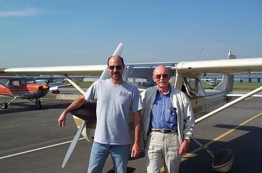Private Pilot Graduate Mark Capadoca with Flight Test Examiner Donn Richardson, after the completion of Mark's Flight Test.  Langley Flying School.