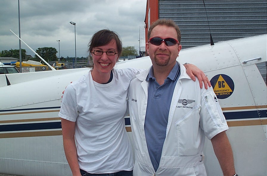 Michelle Thompson with Flight Instructor Dave Page after the completion of Michelle's First Solo Flight on June 13, 2008.  Langley Flying School.