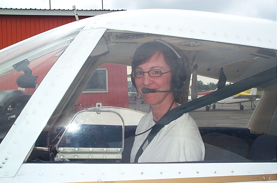 Michelle Thompson in Piper Cherokee GCEP after the completion of her First Solo Flight on June 13, 2008.  Langley Flying School.