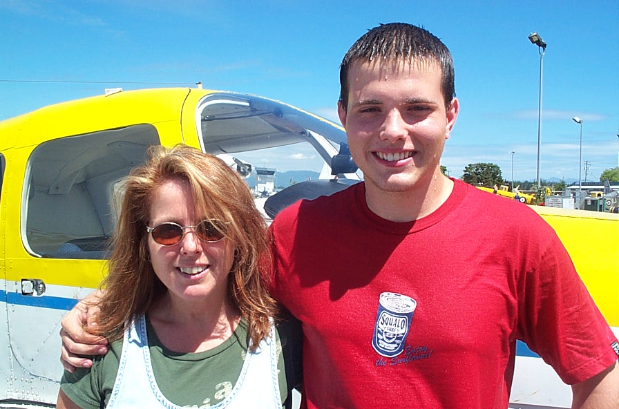 Ryan Fielding with his Mother after the completion of Ryan's First Solo Flight on July 21, 2008.  Langley Flying School