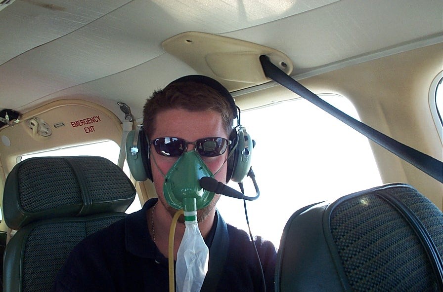 Oxygen masks at altitude.  Langley Flying School.