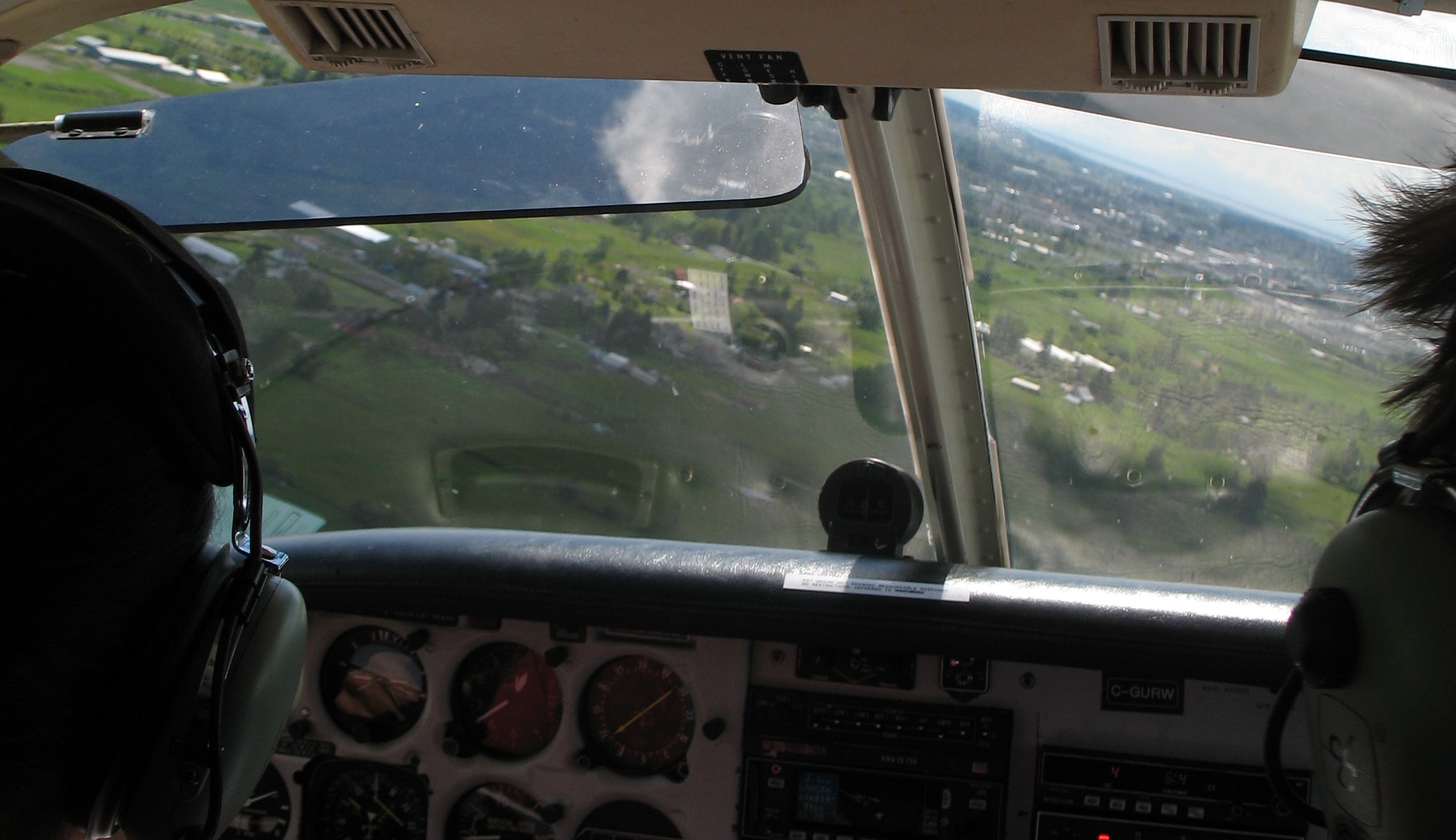 Commercial Pilot Sukhmani Brar rolling out on final approach on to Langley's Runway 19.  Langley Flying School.
