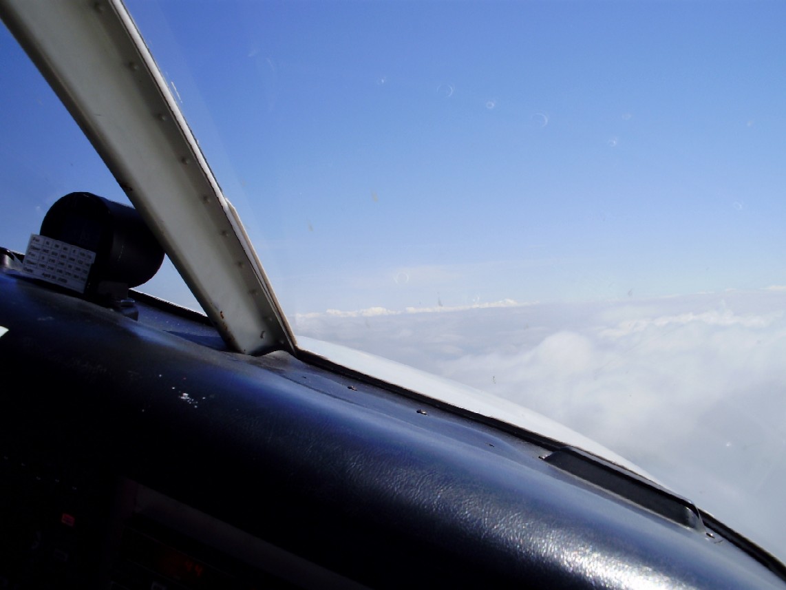 The Seneca on top during a hold piloted by Sukhmani. Langley Flying School.
