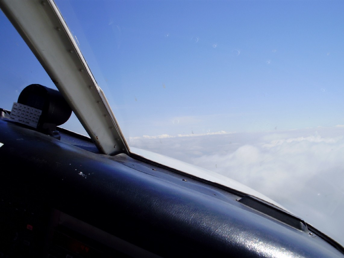 The Seneca on top during a hold piloted by Sukhmani.  Langley Flying School.