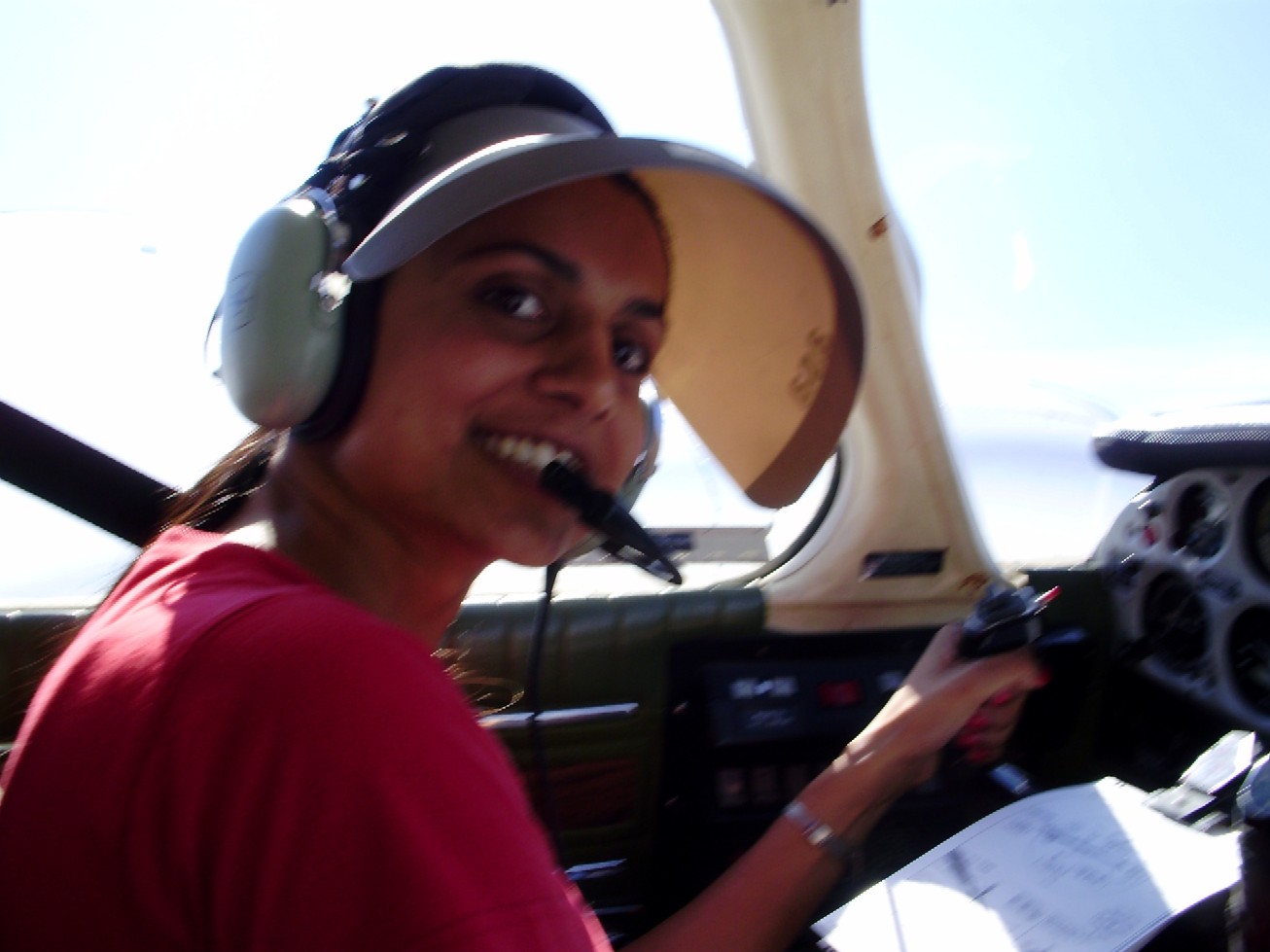 Sukhmani Brar looks up at her Flight Instructor, Philip Craig, during her IFR training flight.  Langley Flying School.