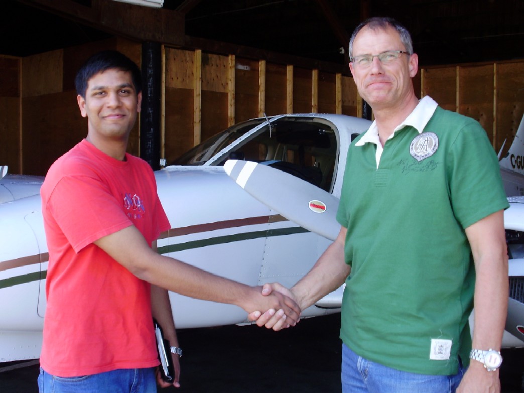 Suraj and Matt after Suraj's Multi-engine Flight Test--satisfaction, achievement. Langley Flying School.